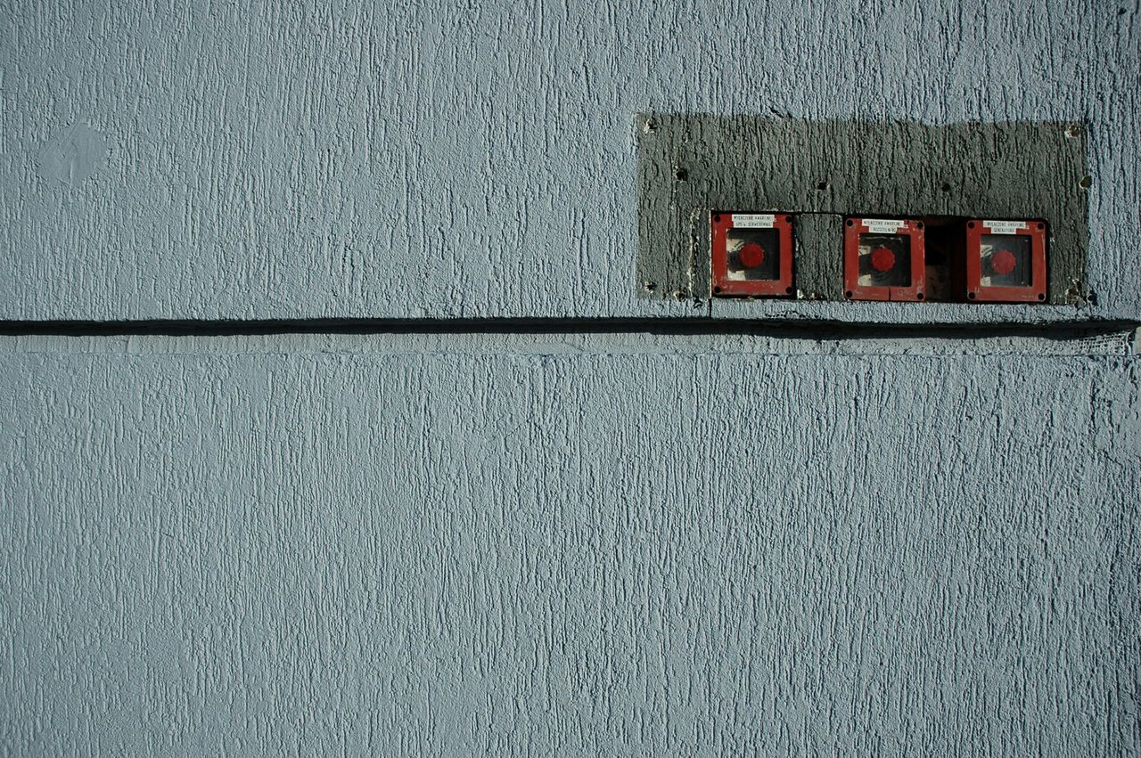 Fire alarm switches on wall