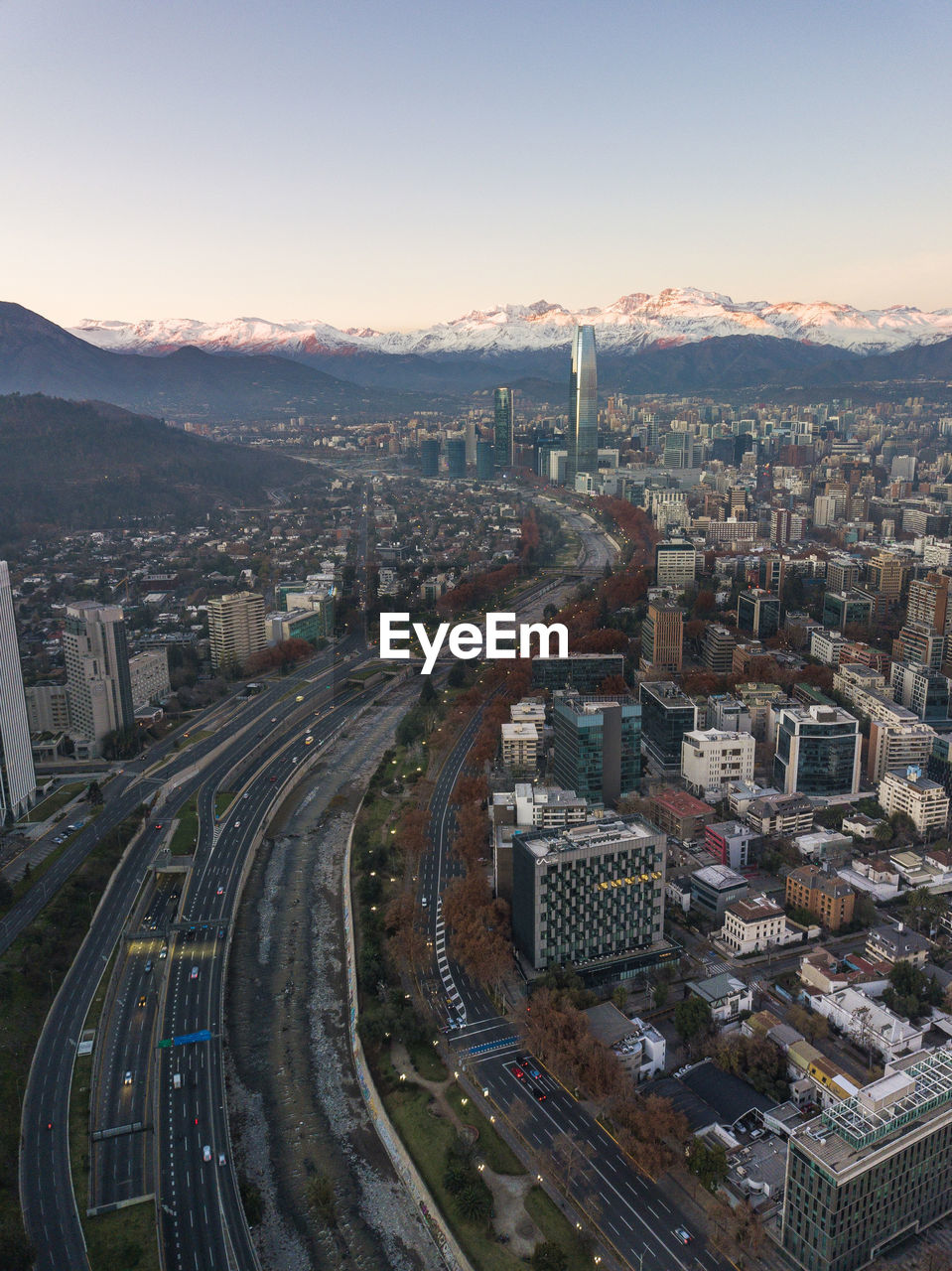 high angle view of cityscape against sky during sunset