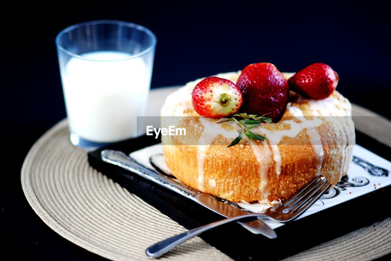 Close-up of dessert with drink served on table