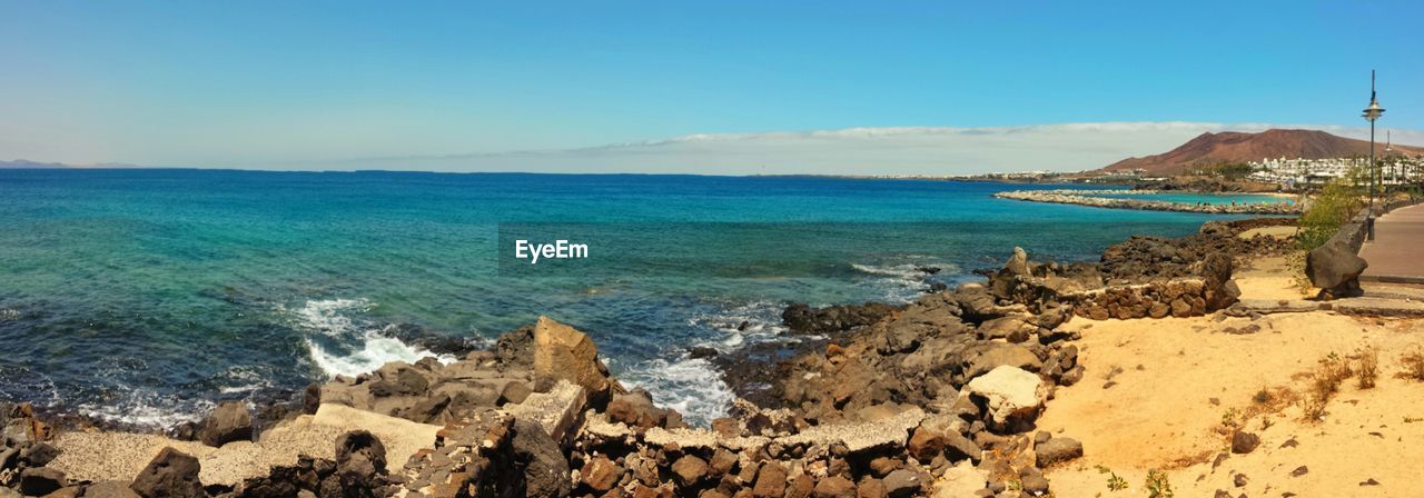 View of calm blue sea against the sky