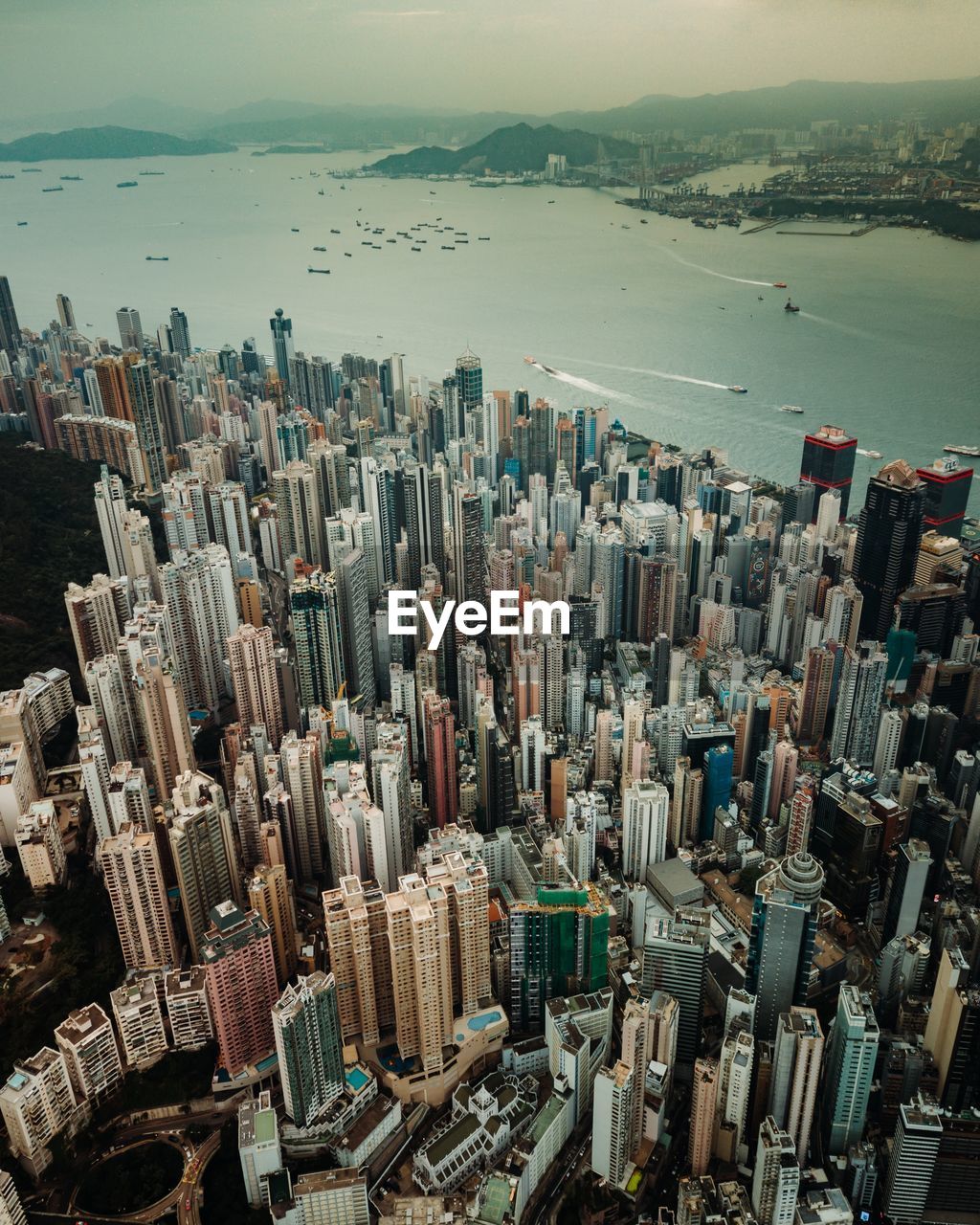 Aerial view of modern buildings by river