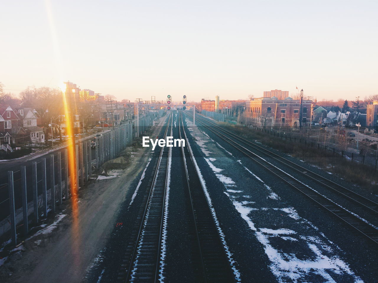 Road in city at sunset