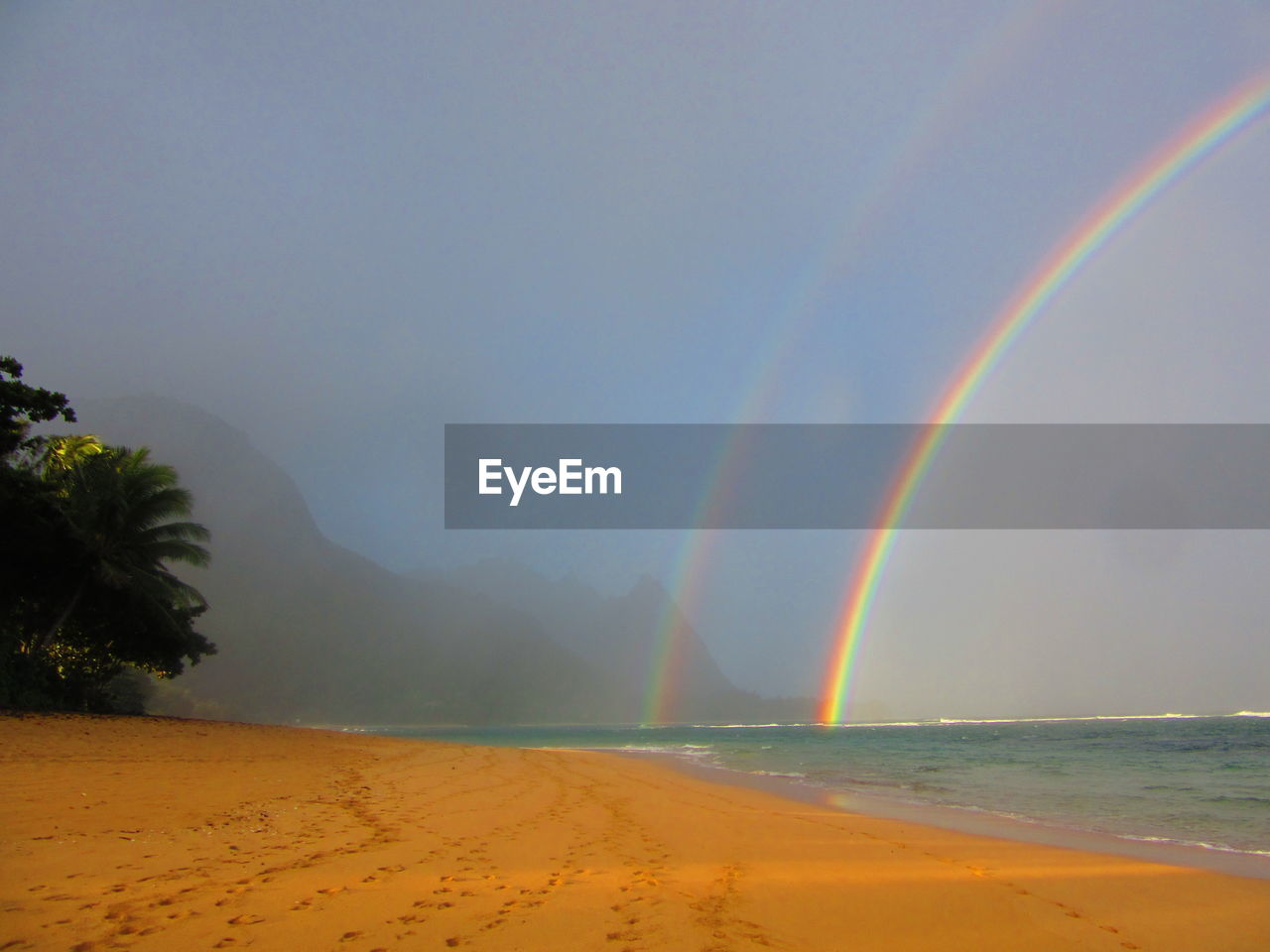 RAINBOW OVER BEACH