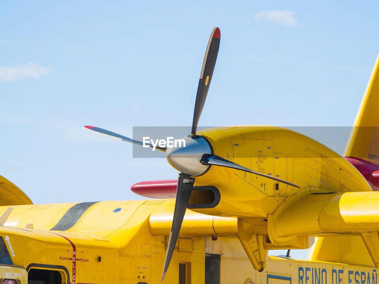 CLOSE-UP OF AIRPLANE AGAINST SKY