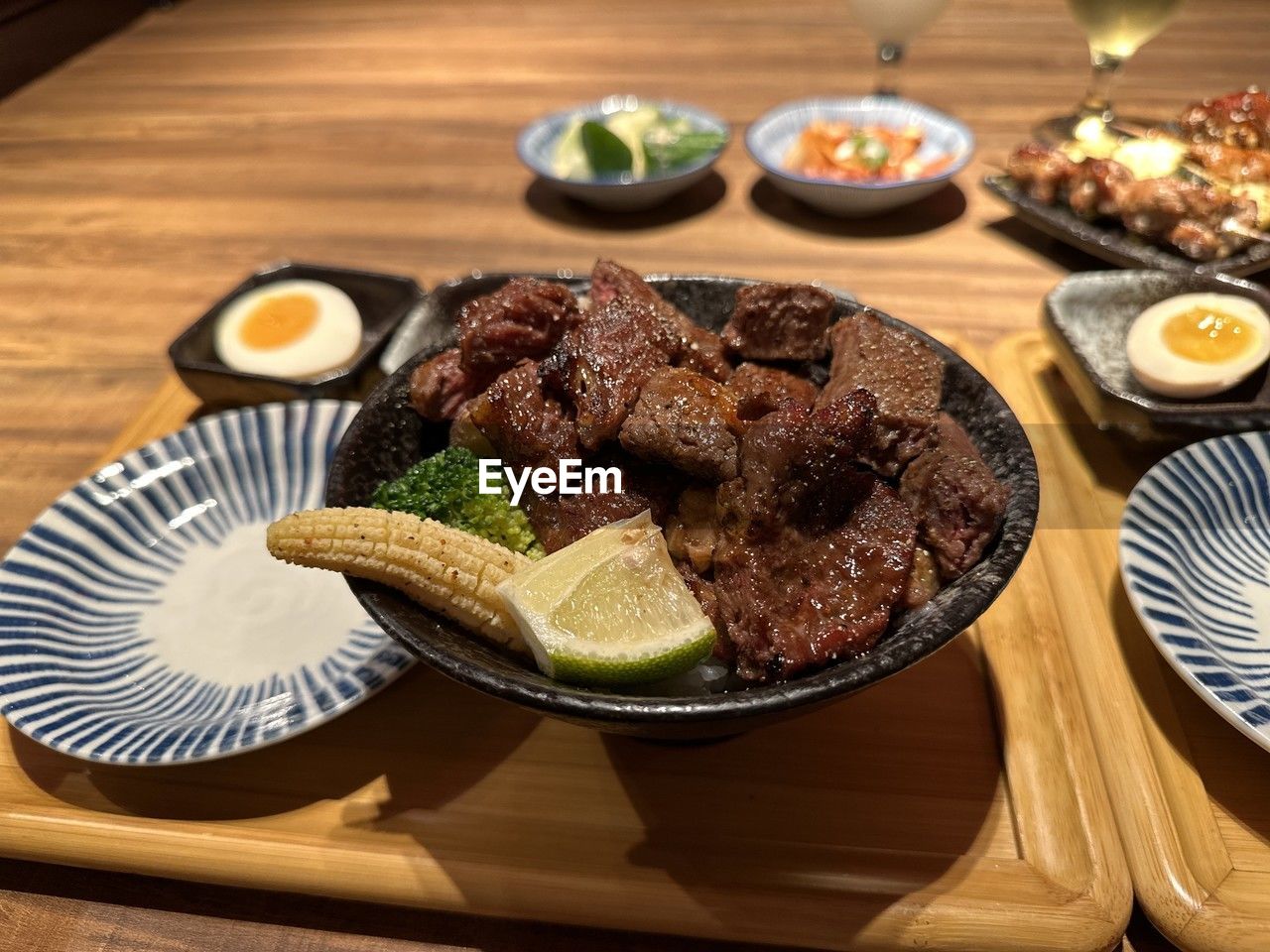 food and drink, food, meat, vegetable, table, dish, healthy eating, plate, freshness, meal, cuisine, red meat, beef, no people, indoors, dinner, wood, galbi, fruit, wellbeing, grilled, barbecue, focus on foreground, restaurant