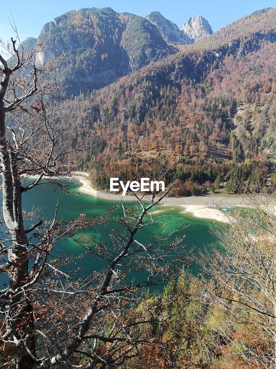 SCENIC VIEW OF LAKE BY MOUNTAINS