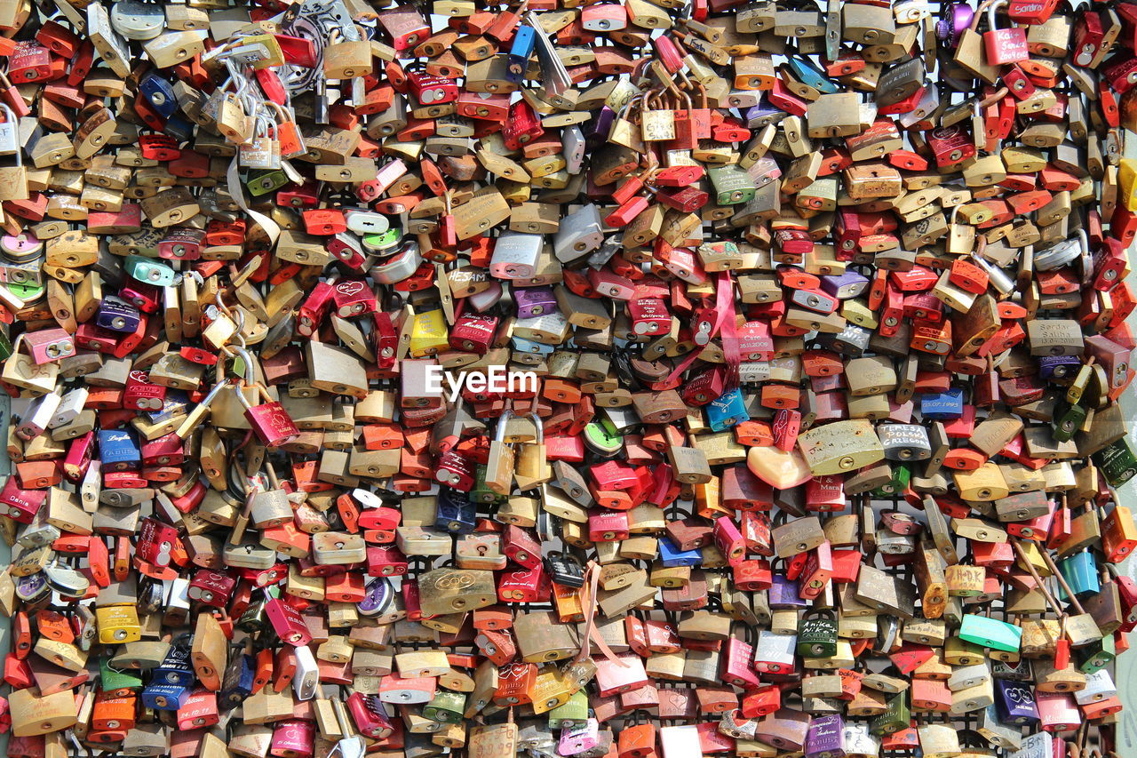 padlock, abundance, lock, love, security, large group of objects, protection, love lock, positive emotion, full frame, backgrounds, multi colored, crowd, emotion, day, railing, hope, architecture, built structure, outdoors, art, heart shape, variation, hanging, metal, bridge, fence, luck, togetherness, travel destinations