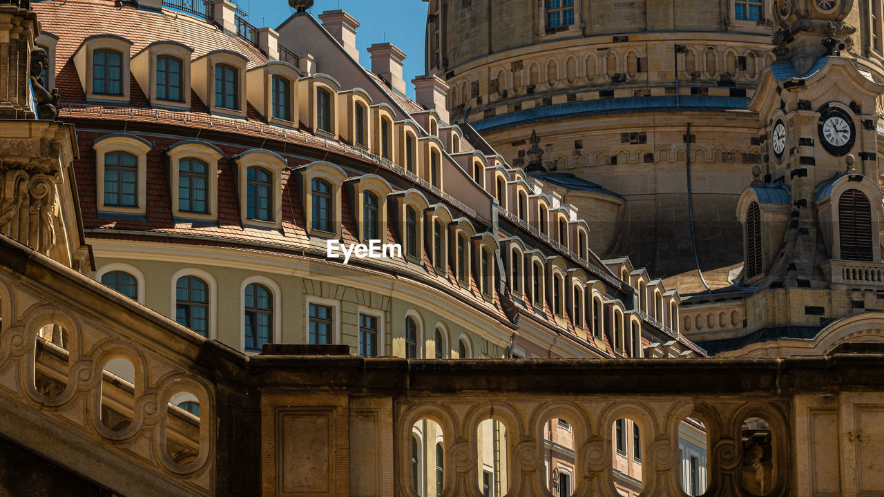 LOW ANGLE VIEW OF BUILDINGS IN TOWN