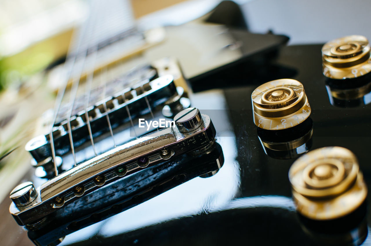 Close-up of black guitar