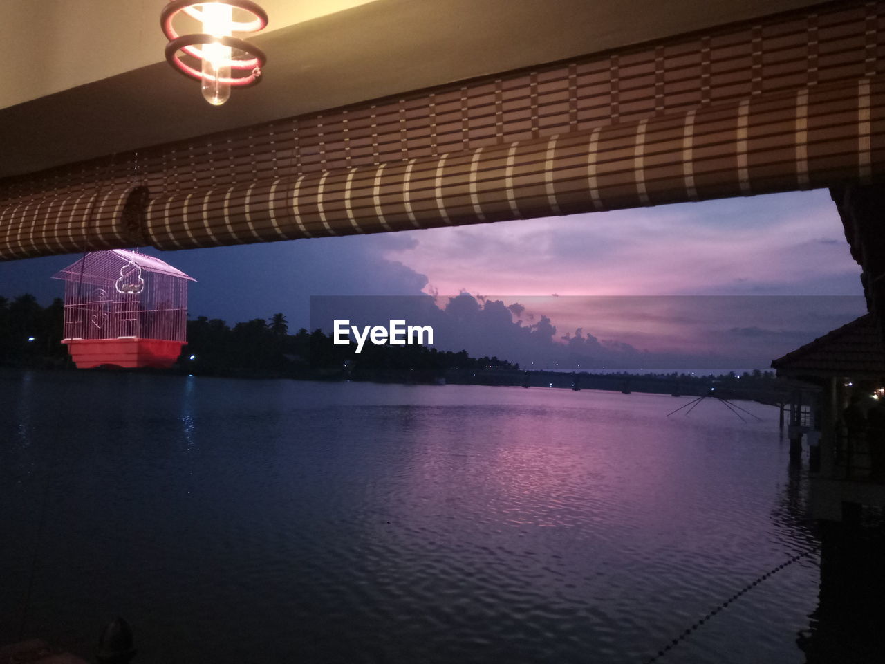 SCENIC VIEW OF BRIDGE OVER LAKE AGAINST SKY