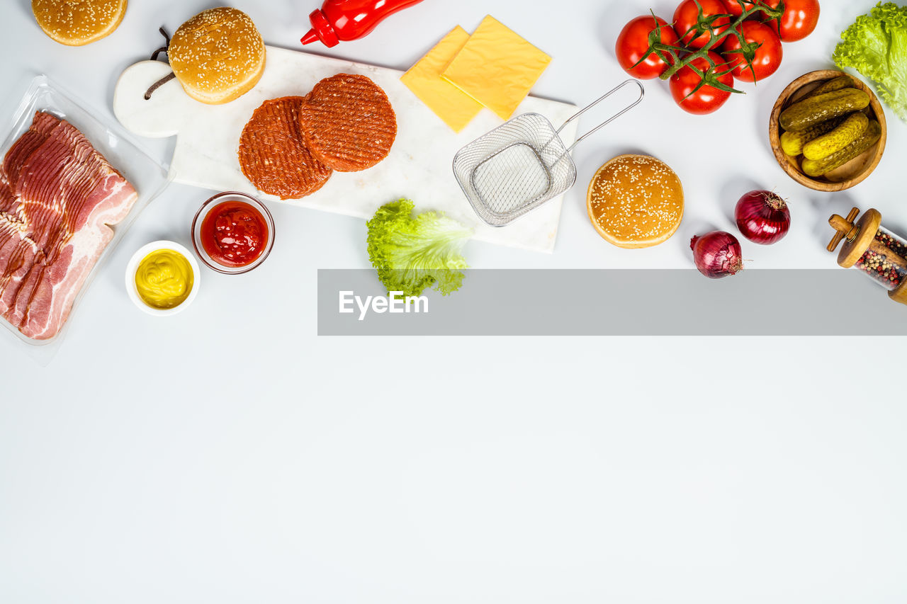 Close-up of burgers on serving board