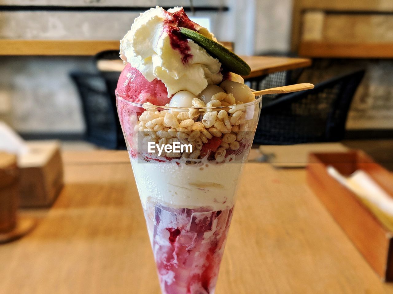 CLOSE-UP OF ICE CREAM IN GLASS