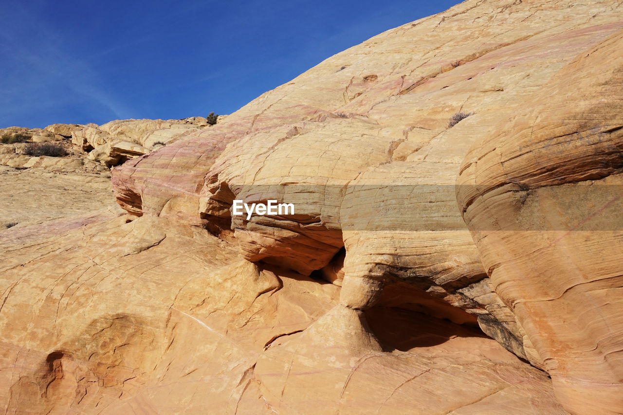Low angle view of rock formations in desert