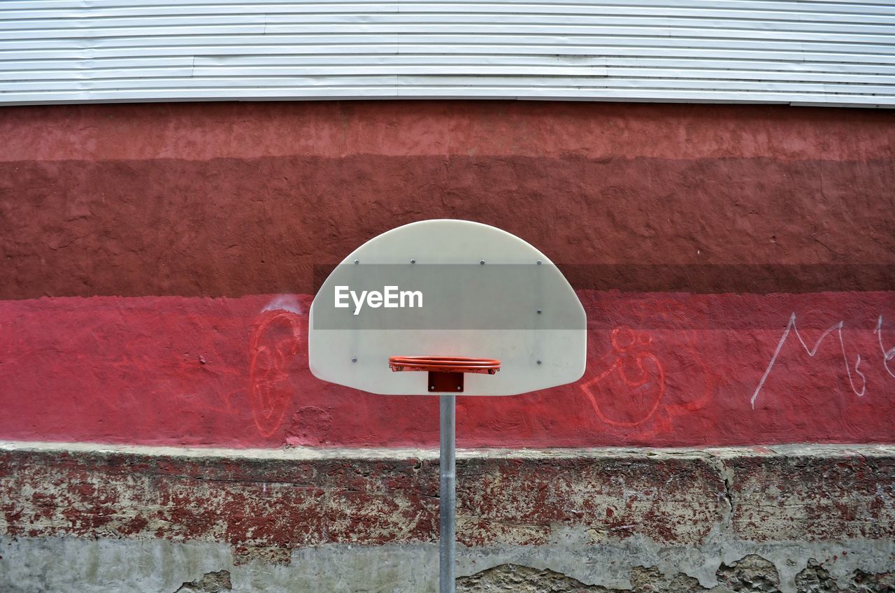 Close-up of basketball basket on wall