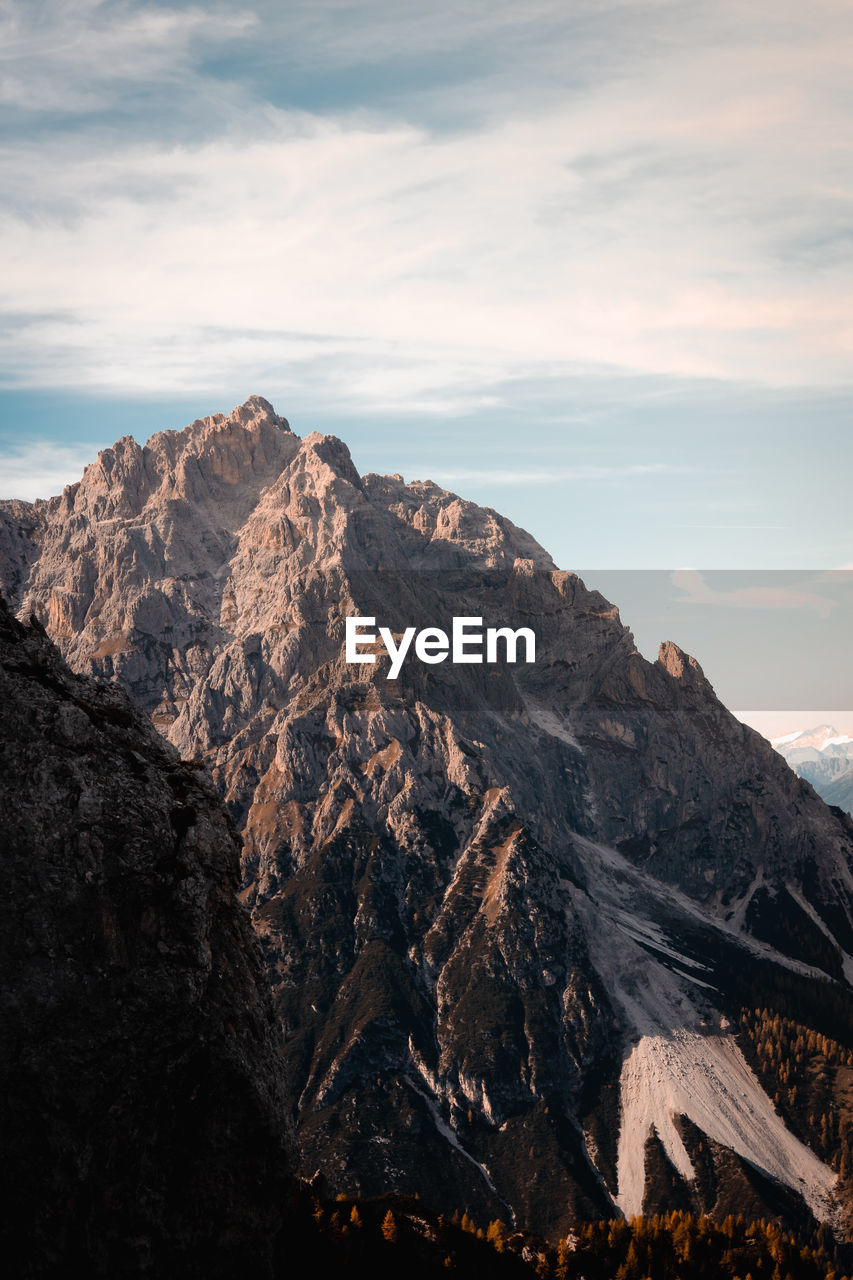 Scenic view of mountain range against sky