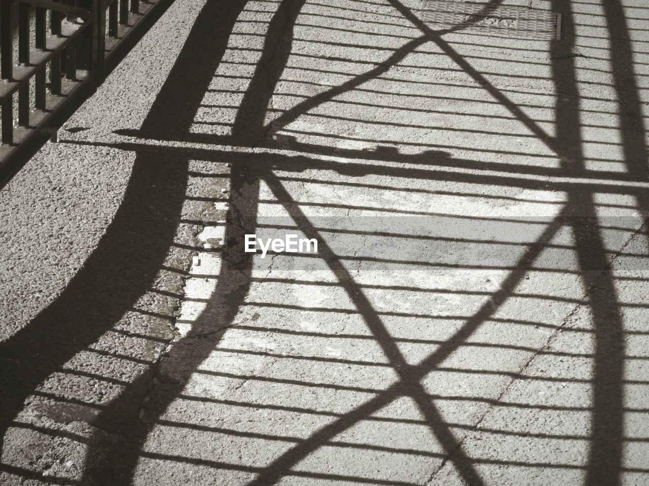 CLOSE-UP OF SHADOW ON TILED FLOOR