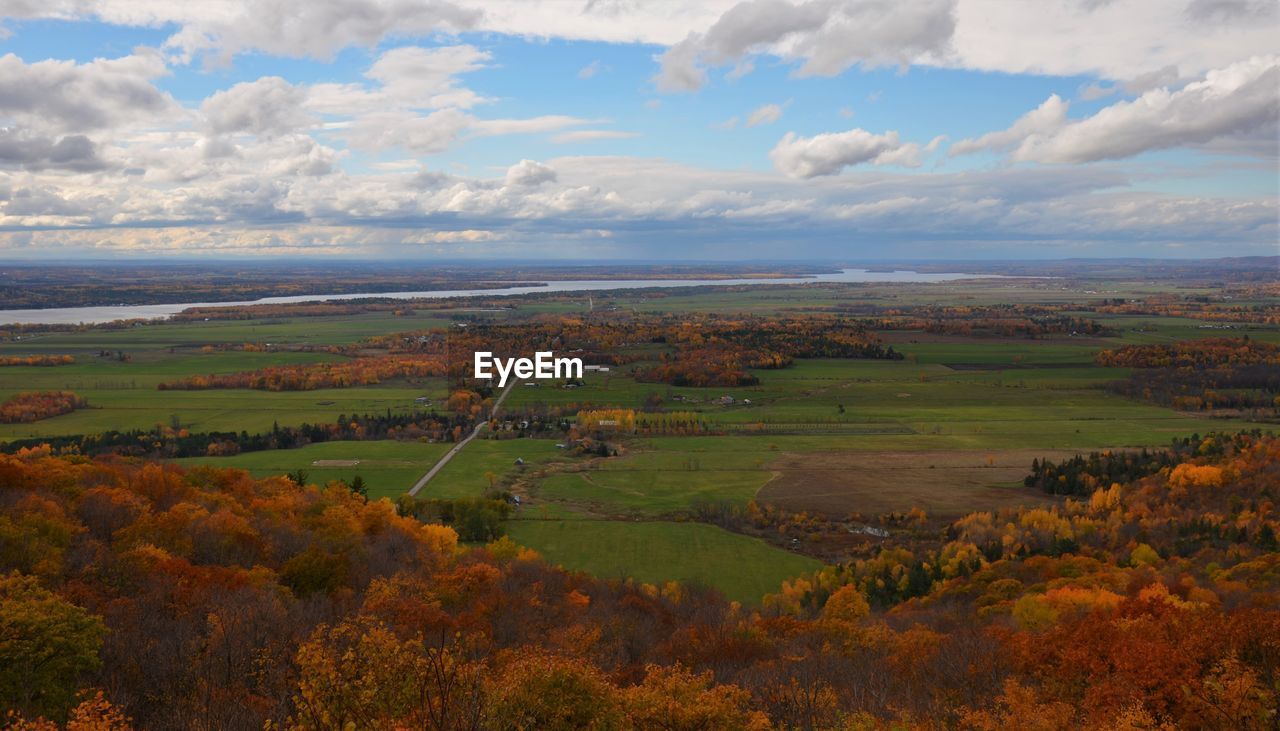 Scenic view of landscape against sky during autumn