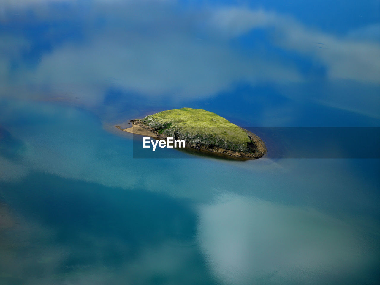 Small island in the middle of froststadavatn lake