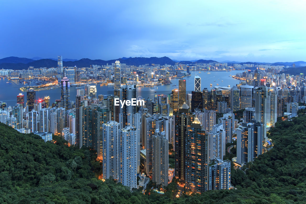 Illuminated two international finance center in city seen from victoria peak