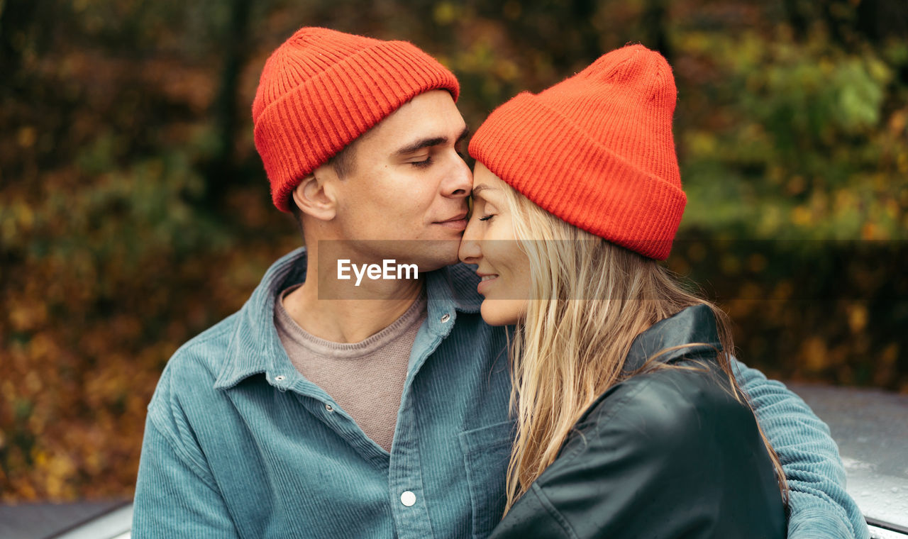 Tender loving relationship in a couple. close-up of a man hugging a woman.