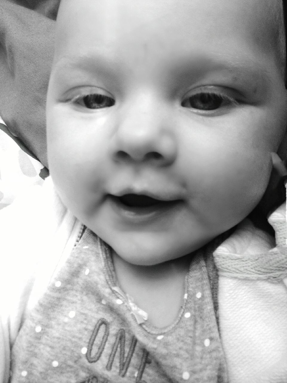 CLOSE-UP PORTRAIT OF SMILING BABY