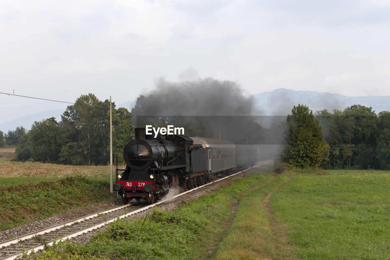 TRAIN ON RAILROAD TRACK