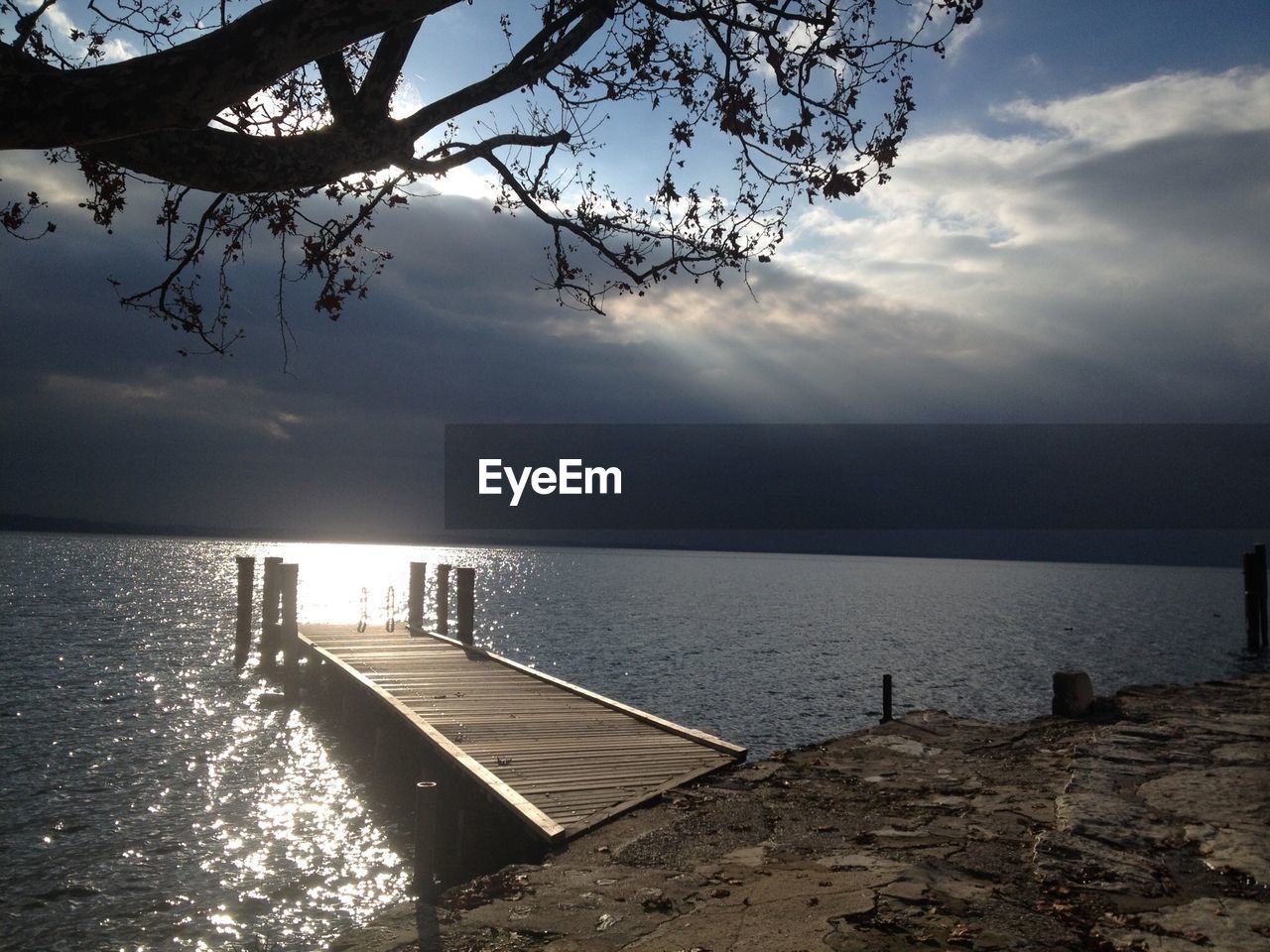 PIER OVER SEA AGAINST SKY