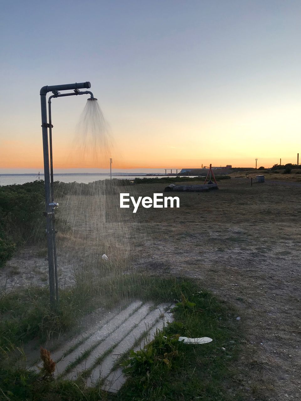 Scenic view of sea against clear sky during sunset