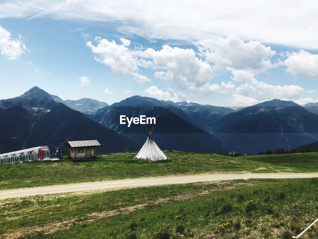 Scenic view of landscape and mountains against sky