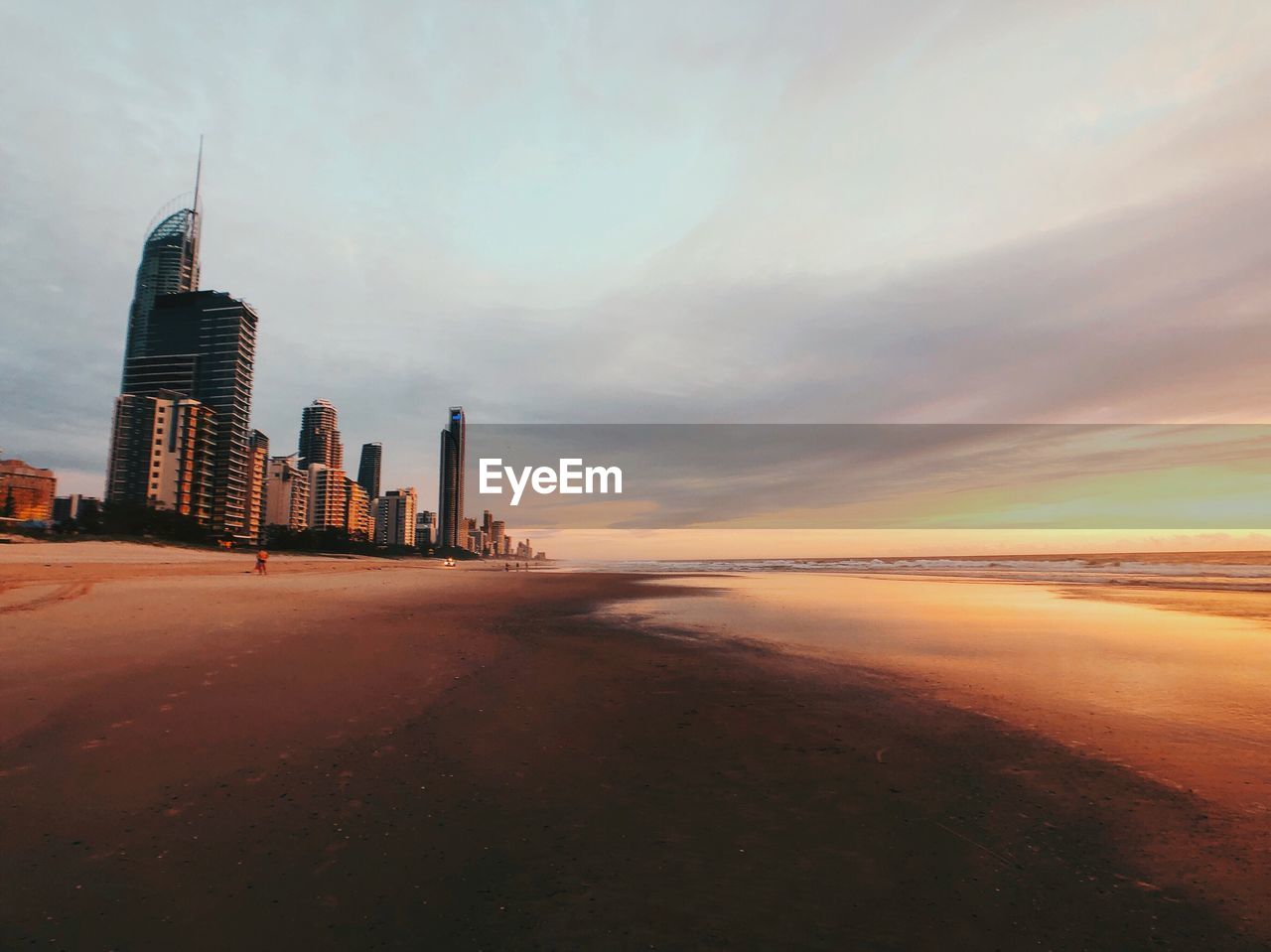 VIEW OF CITY BUILDINGS AT SUNSET