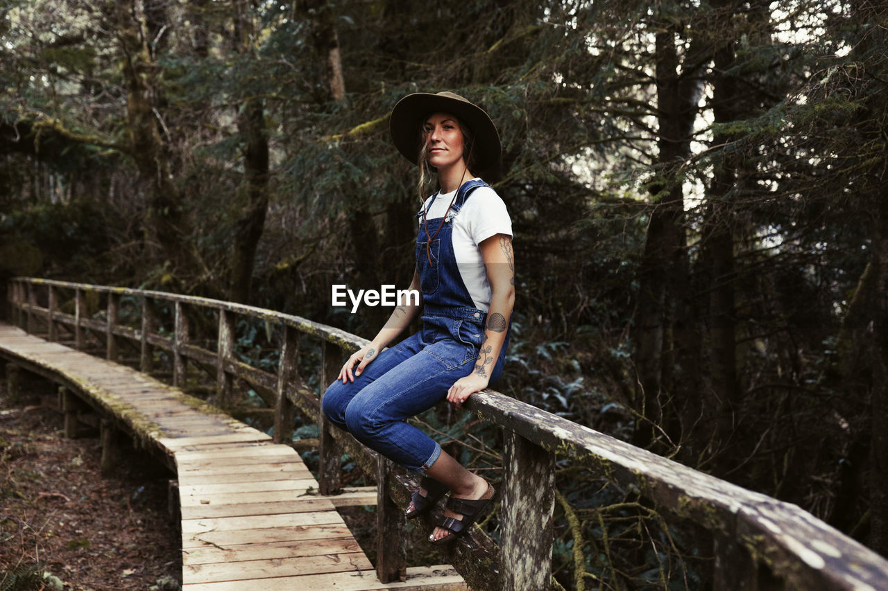 Beautiful woman in the forest near tofino