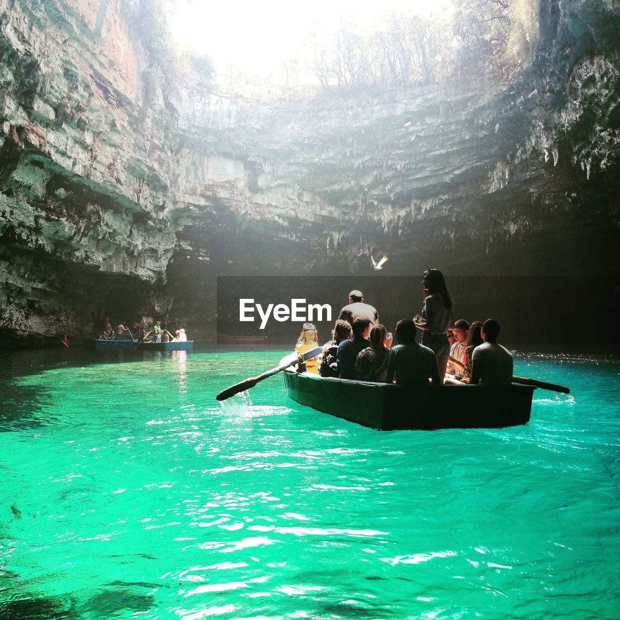 People in boat on sea