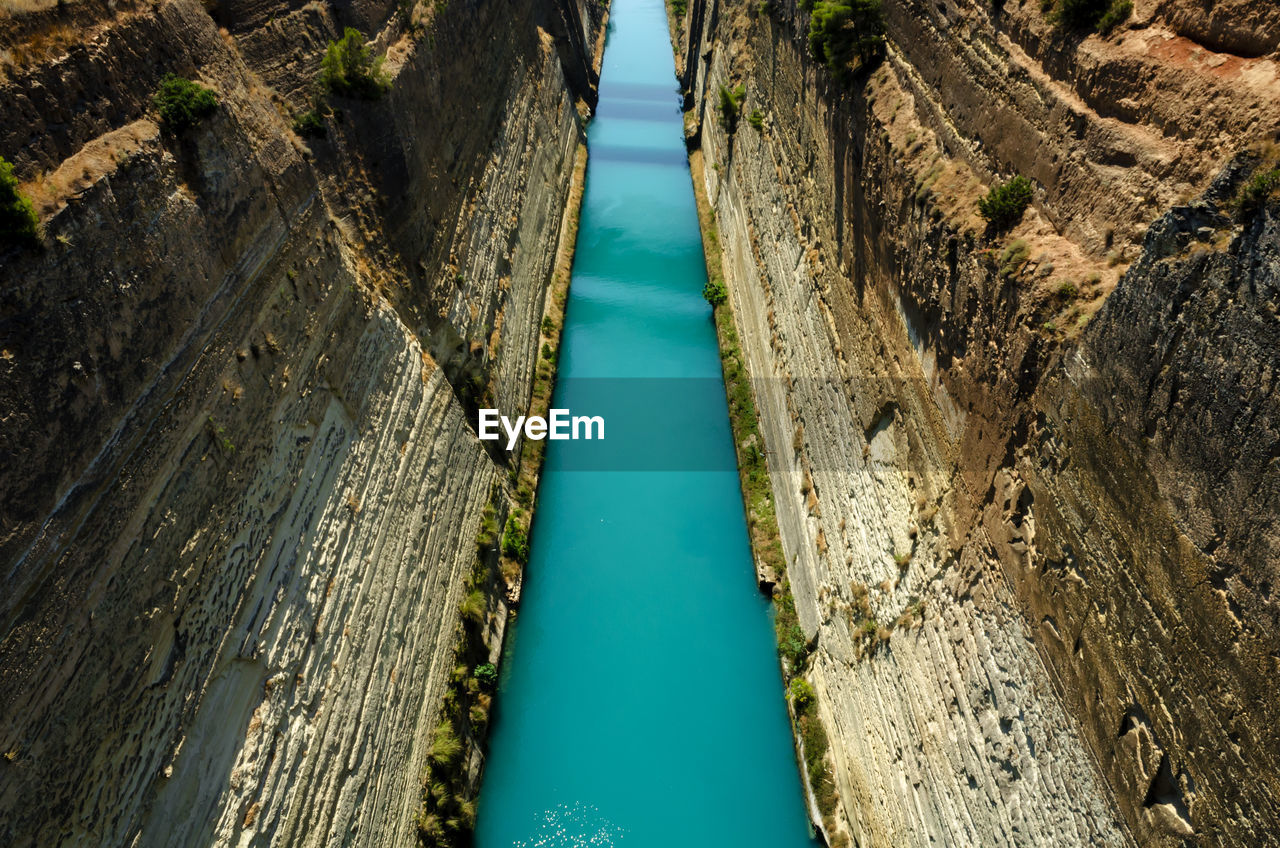 High angle view of river amidst rocky mountains