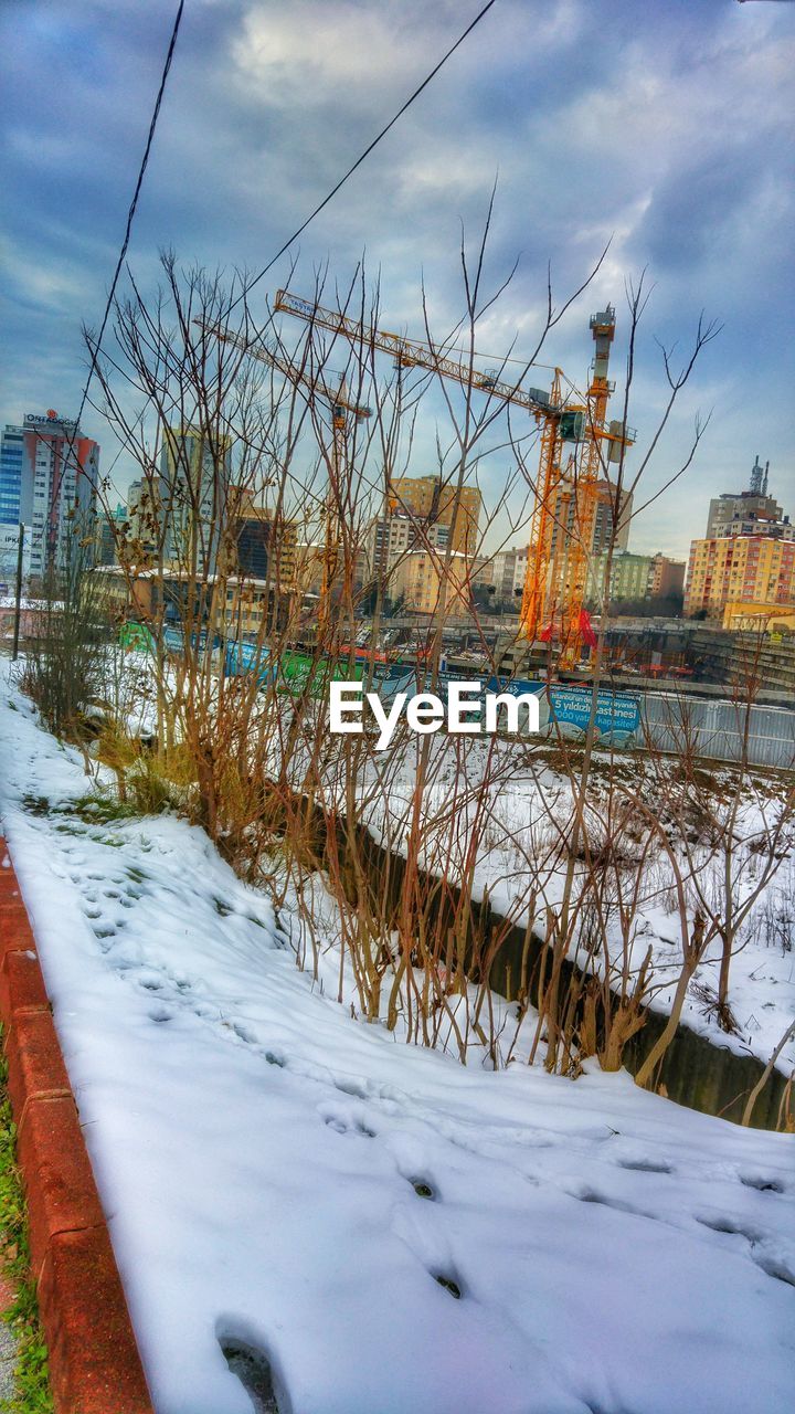 VIEW OF SNOW COVERED LANDSCAPE