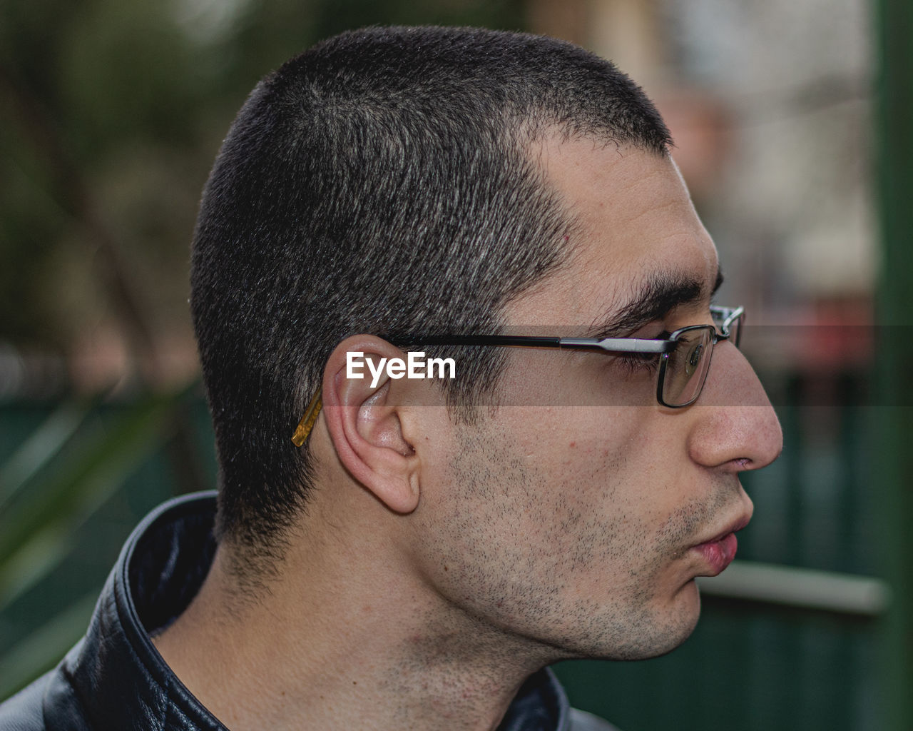 Close-up of young man in eyeglasses