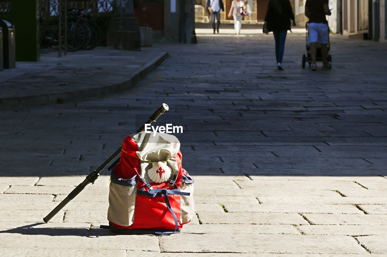 Camino de santiago  to compostela , pilgrim backpack with shell in coruna city , english way , spain