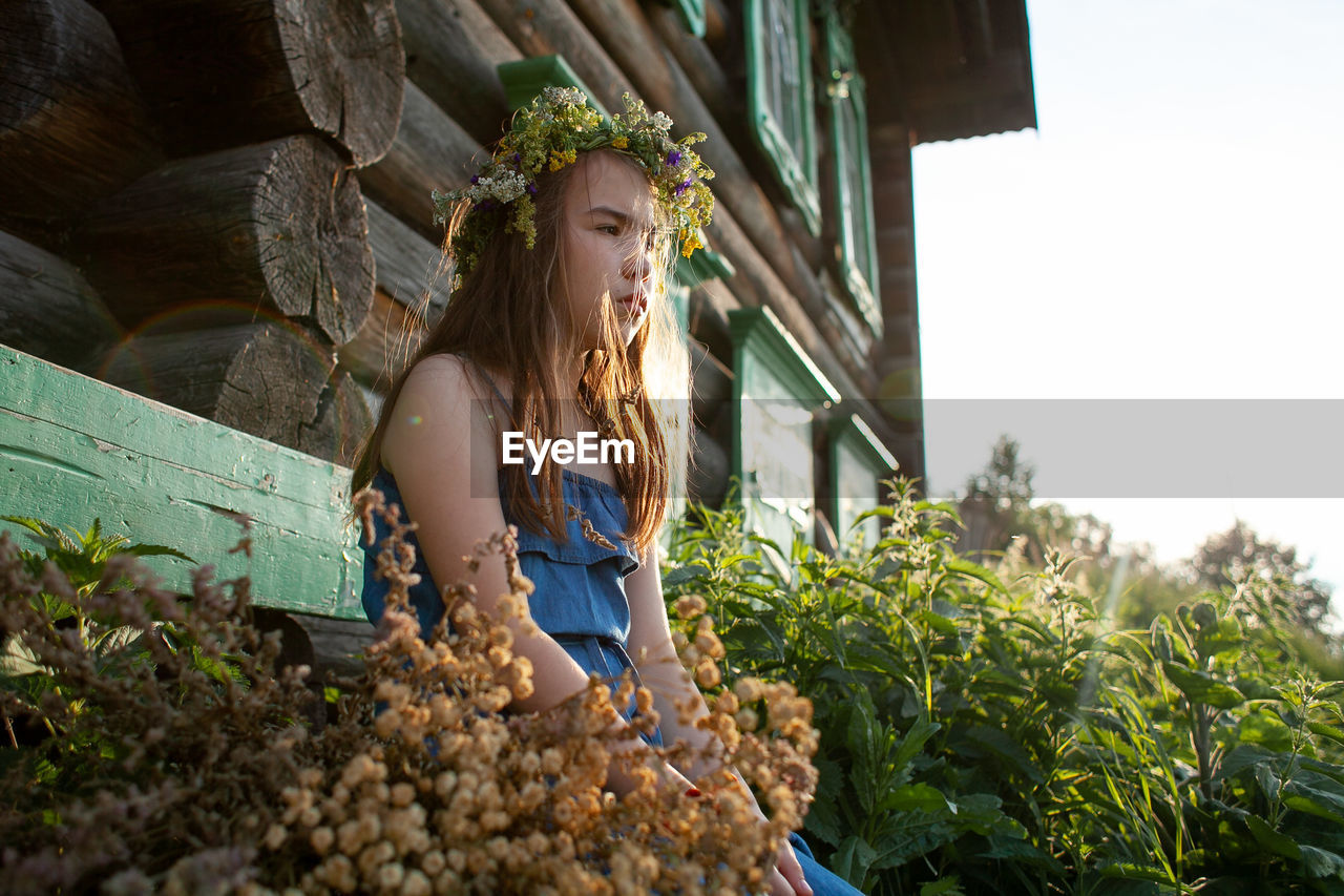 WOMAN LOOKING DOWN