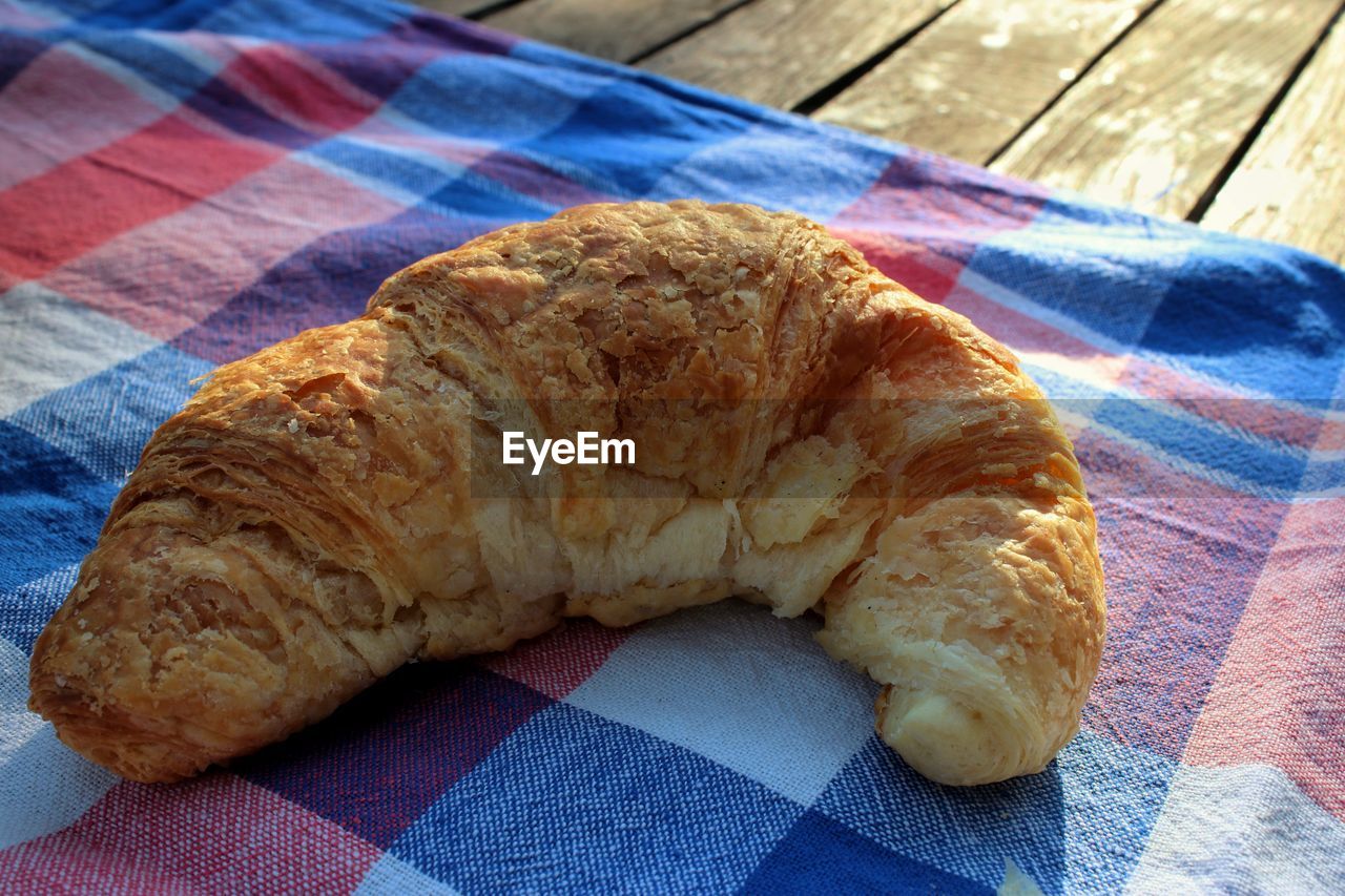 High angle view of croissant on table