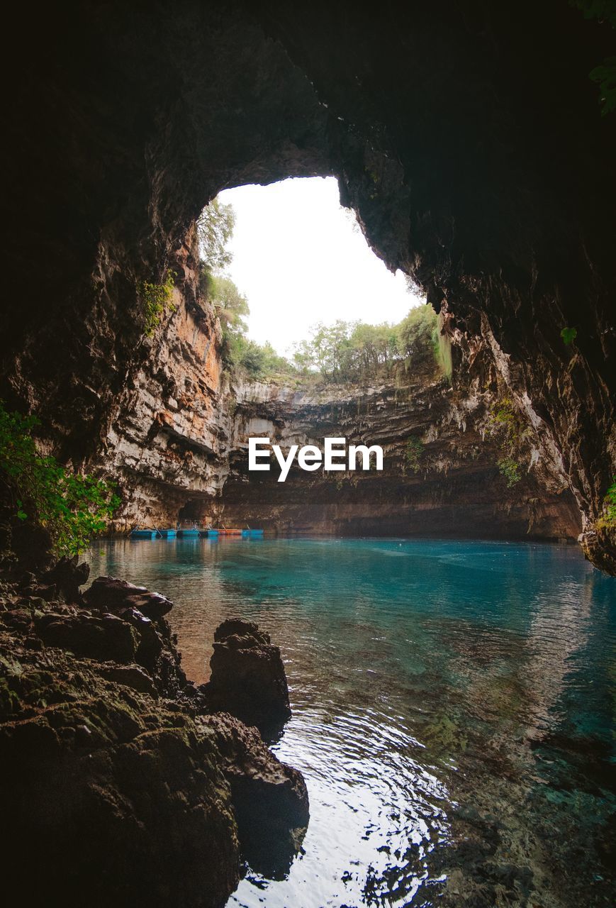 SCENIC VIEW OF SEA THROUGH CAVE