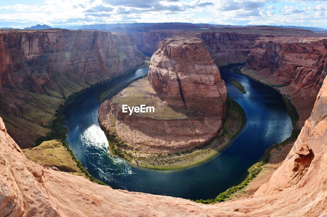 Aerial view of rock formations in river