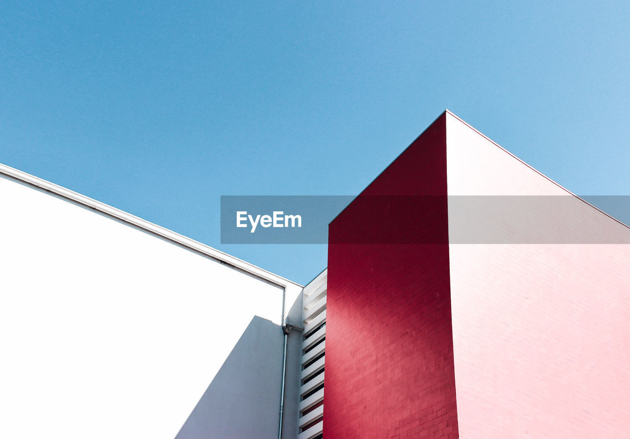 Low angle view of minimal building against clear sky