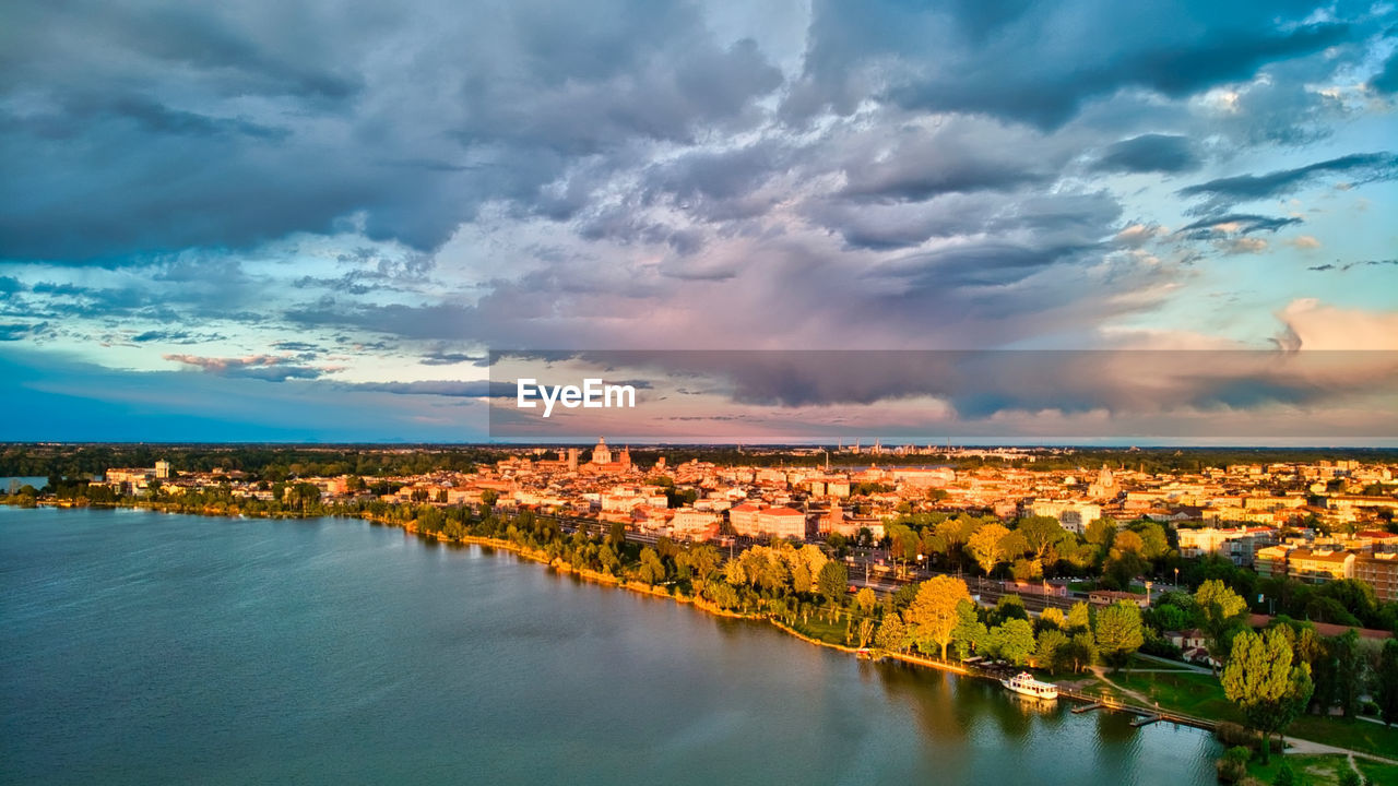 Panoramic view of townscape against sky during sunset