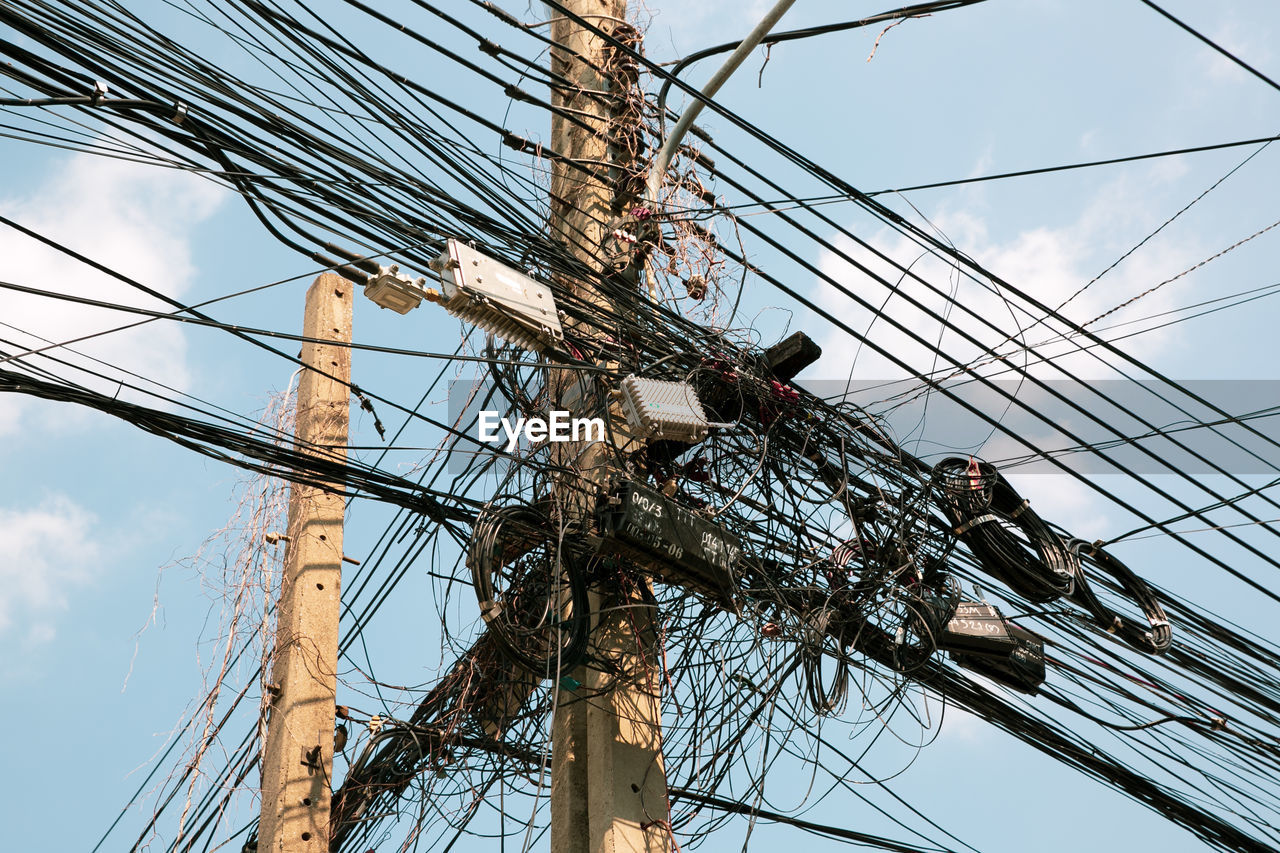 LOW ANGLE VIEW OF ELECTRICITY PYLON