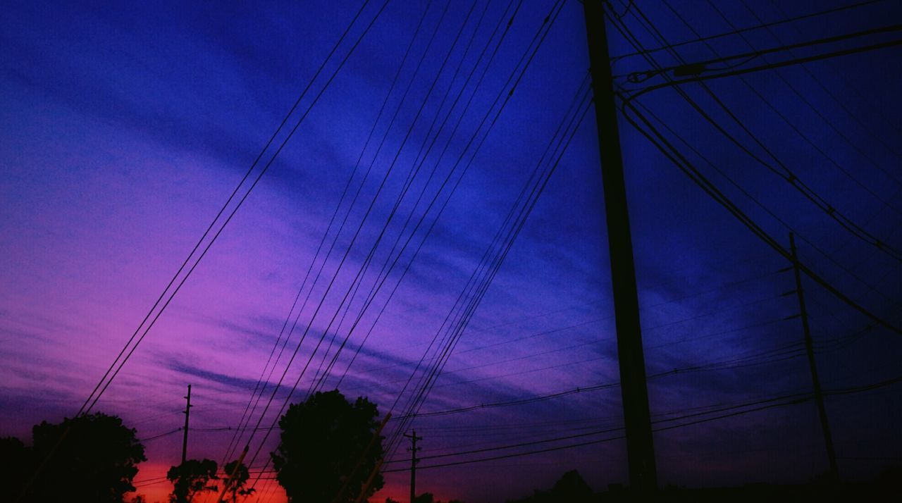 LOW ANGLE VIEW OF ELECTRICITY PYLONS AGAINST SKY