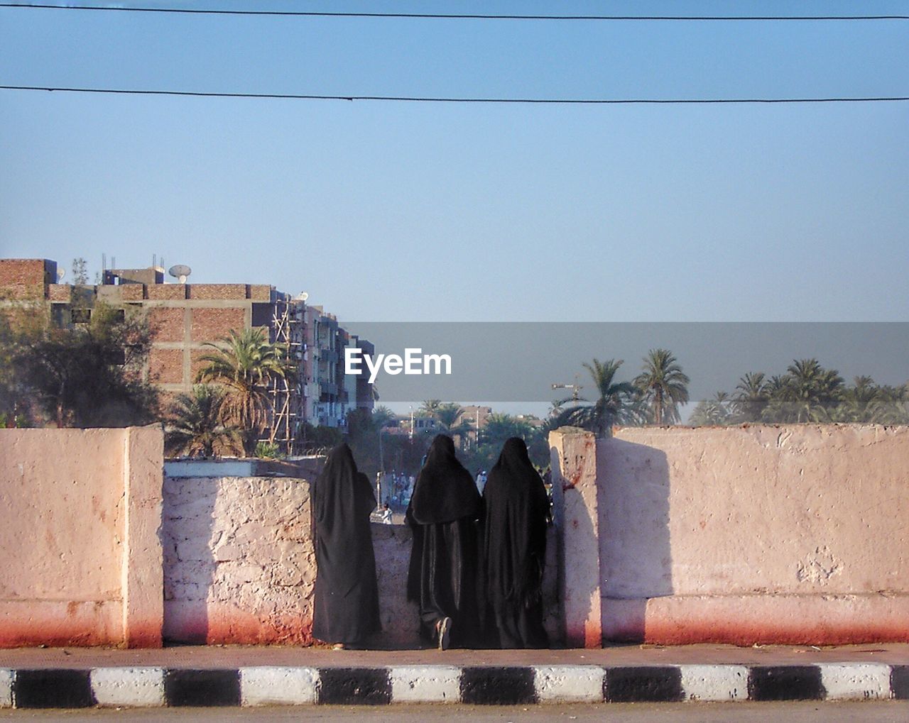 Rear view of women in burka