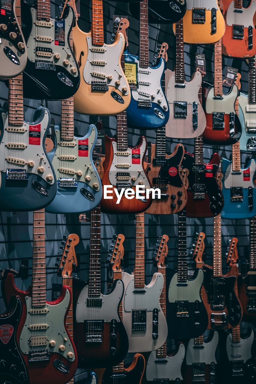 FULL FRAME SHOT OF GUITAR AT STORE