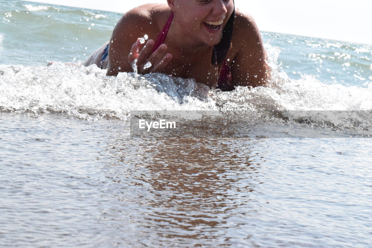 Woman enjoying summer in sea