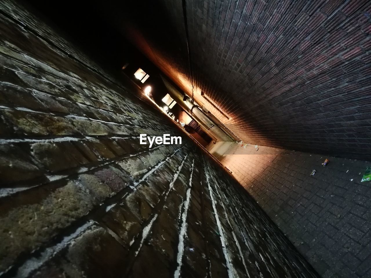 LOW ANGLE VIEW OF ILLUMINATED CEILING AT NIGHT