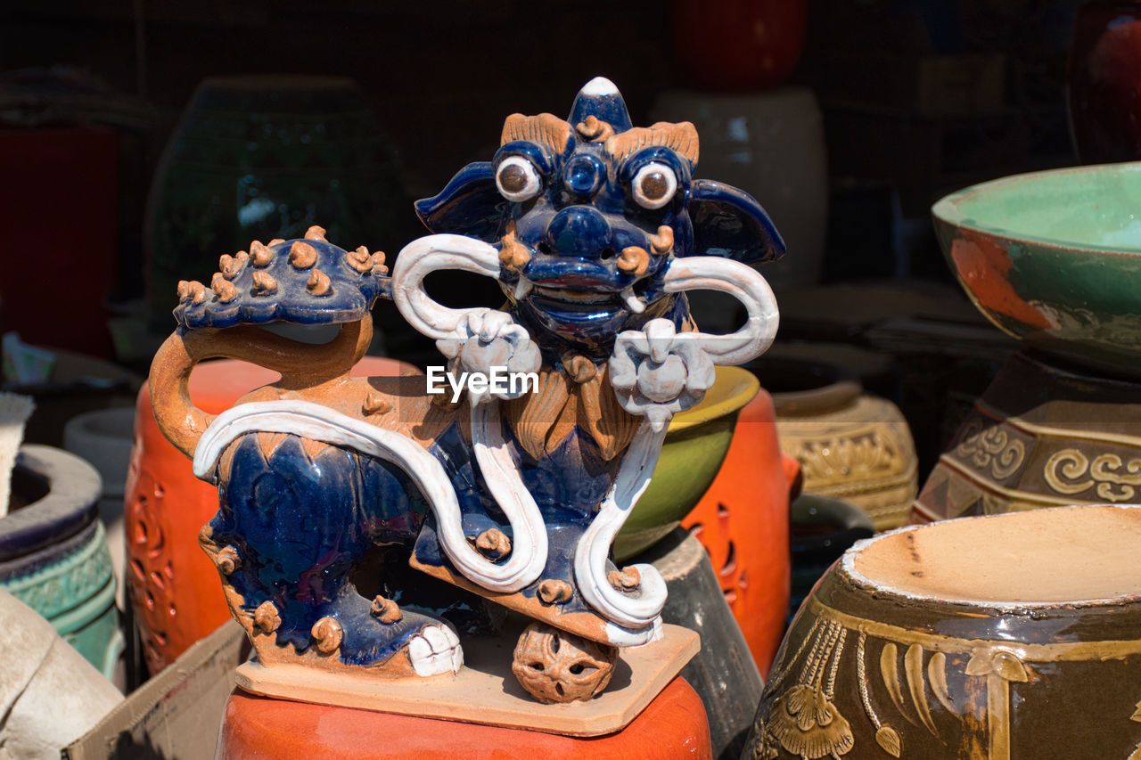 Ccolorful ceramic products with different shapes in the garden of the tao hong tai ceramics factory