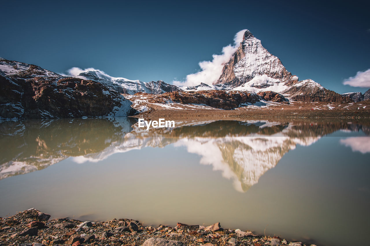 Matterhorn reflection in the theodul glacier lake, switzerland.